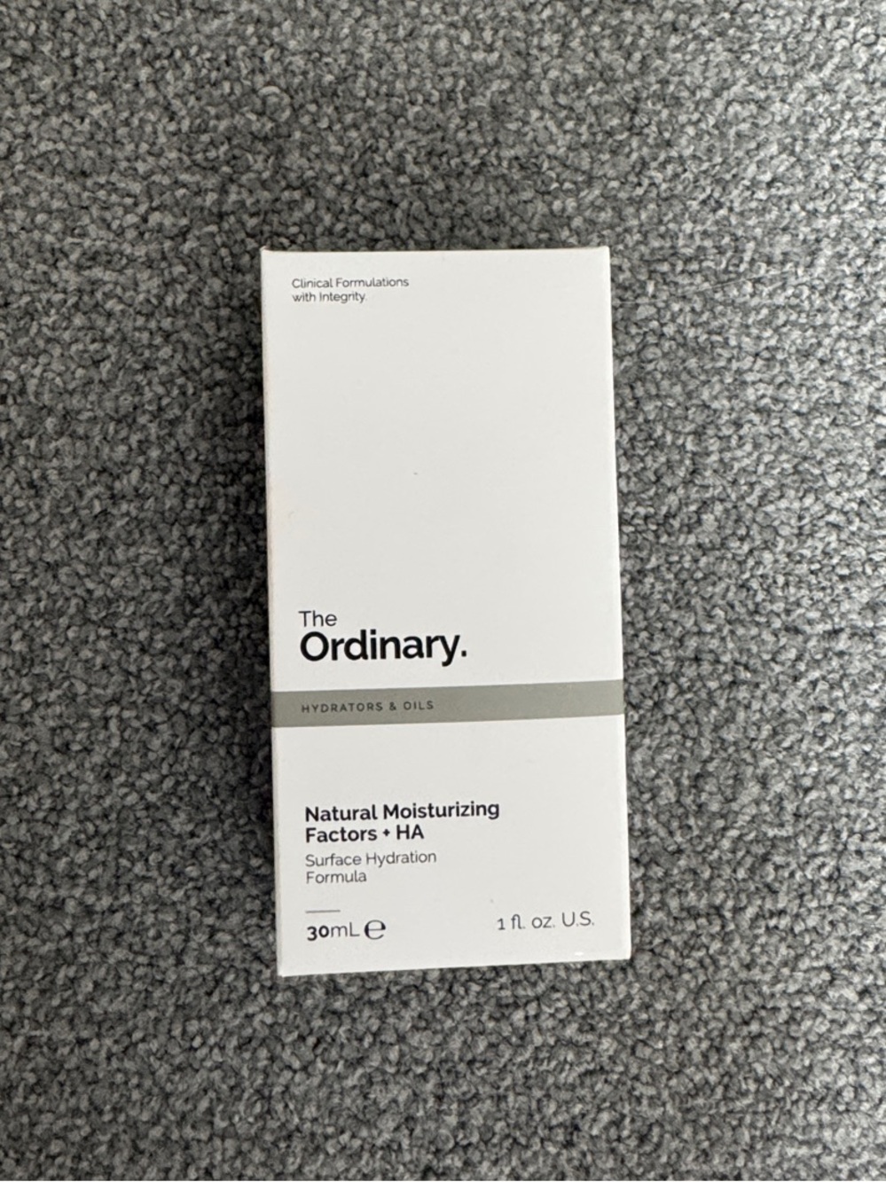 The Ordinary white box with gray band